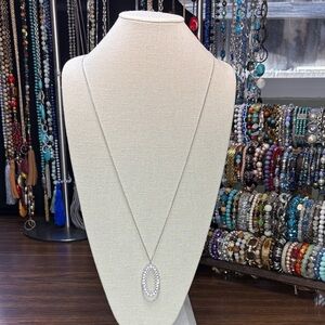 Dazzling Silver Tone Oval Pendant Necklace with Crystals
